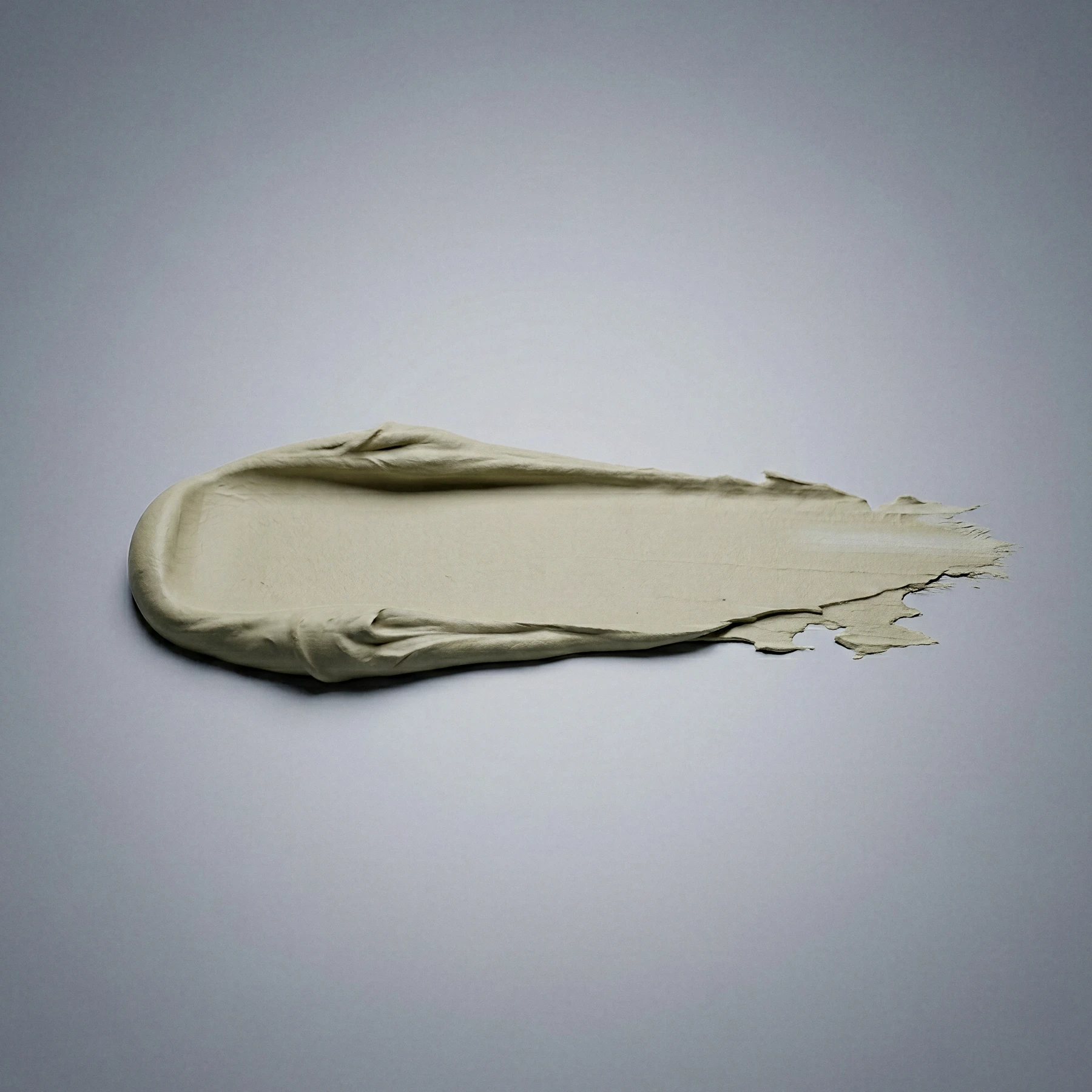 Textuurshot van haarstyling crème smear, productfoto laten maken met AI